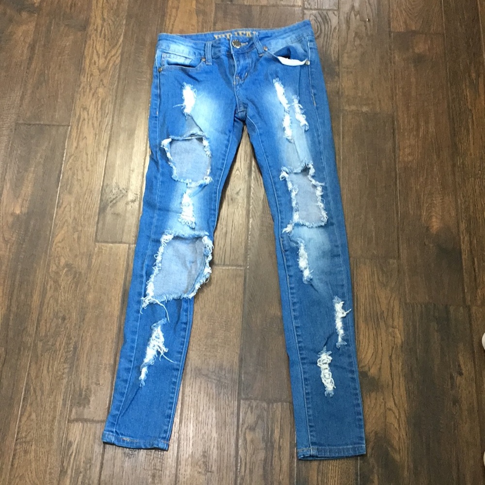 Light blue ripped jeans.